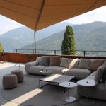 Regenschutz mit Sonnensegel über Outdoorsofa