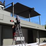 Montagebeginn Sichtschutzsegel Dachterrasse mit bestehenden AX-II Segel