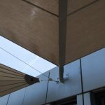 Segel gekoppelt an bestehender Fassade